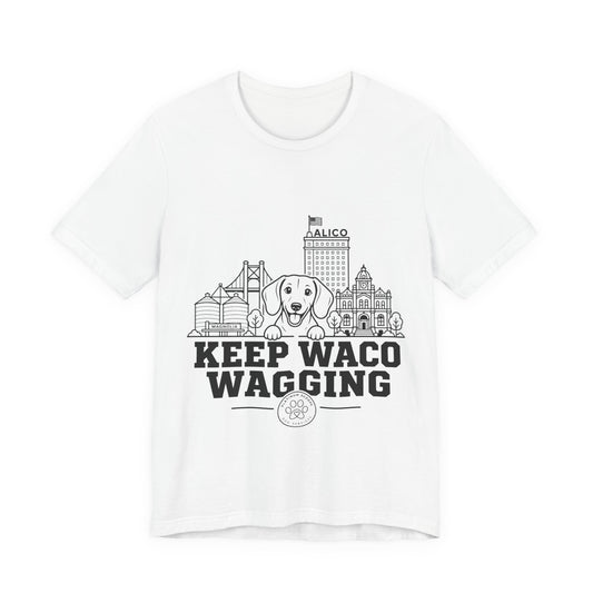 Keep Waco Wagging Dachshund Edition — Dachshund and Waco skyline artwork on White tee